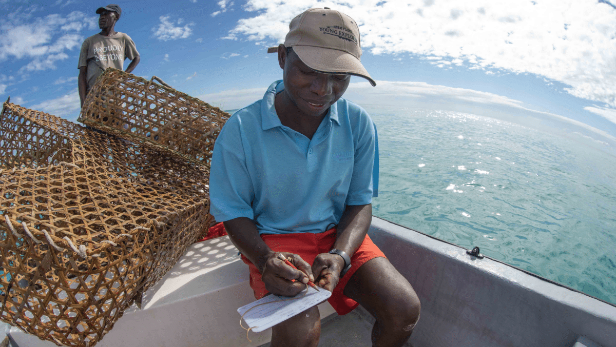Wild Impact diver researching on boat
